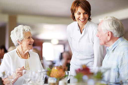 senior couple dining at a senior living community